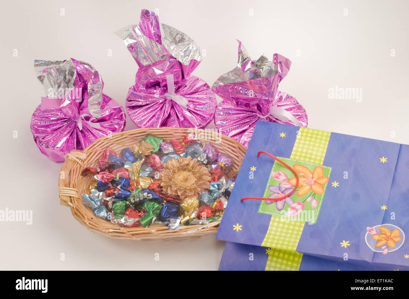 Chocolates in cane basket with shopping bag  Pune Maharashtra India Asia Oct 2011 Stock Photo