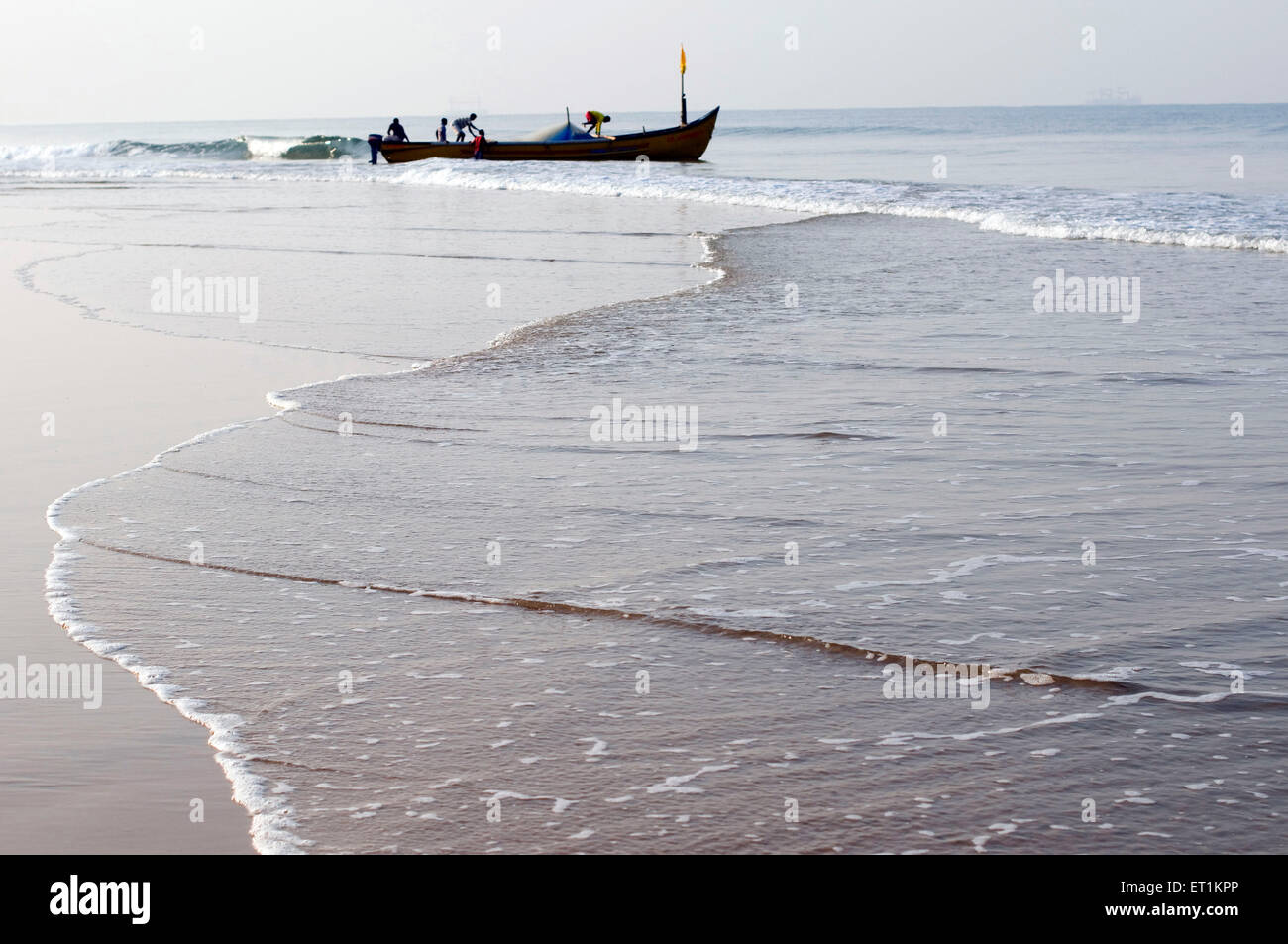 fisherman fishing in boat Calangute Goa India Asia Stock Photo