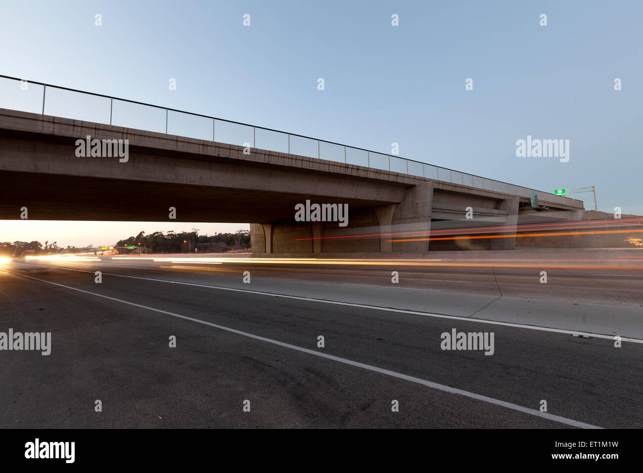 Freeway overpass at twilight Stock Photo