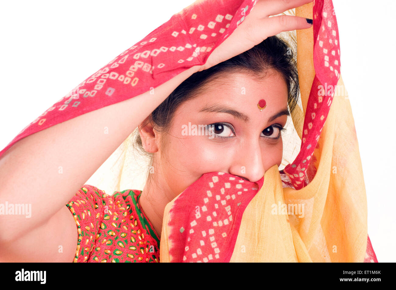 Portrait of Maharashtrian girl wearing ghagra choli and covered head Pune Maharashtra India Asia MR # 686EE Stock Photo