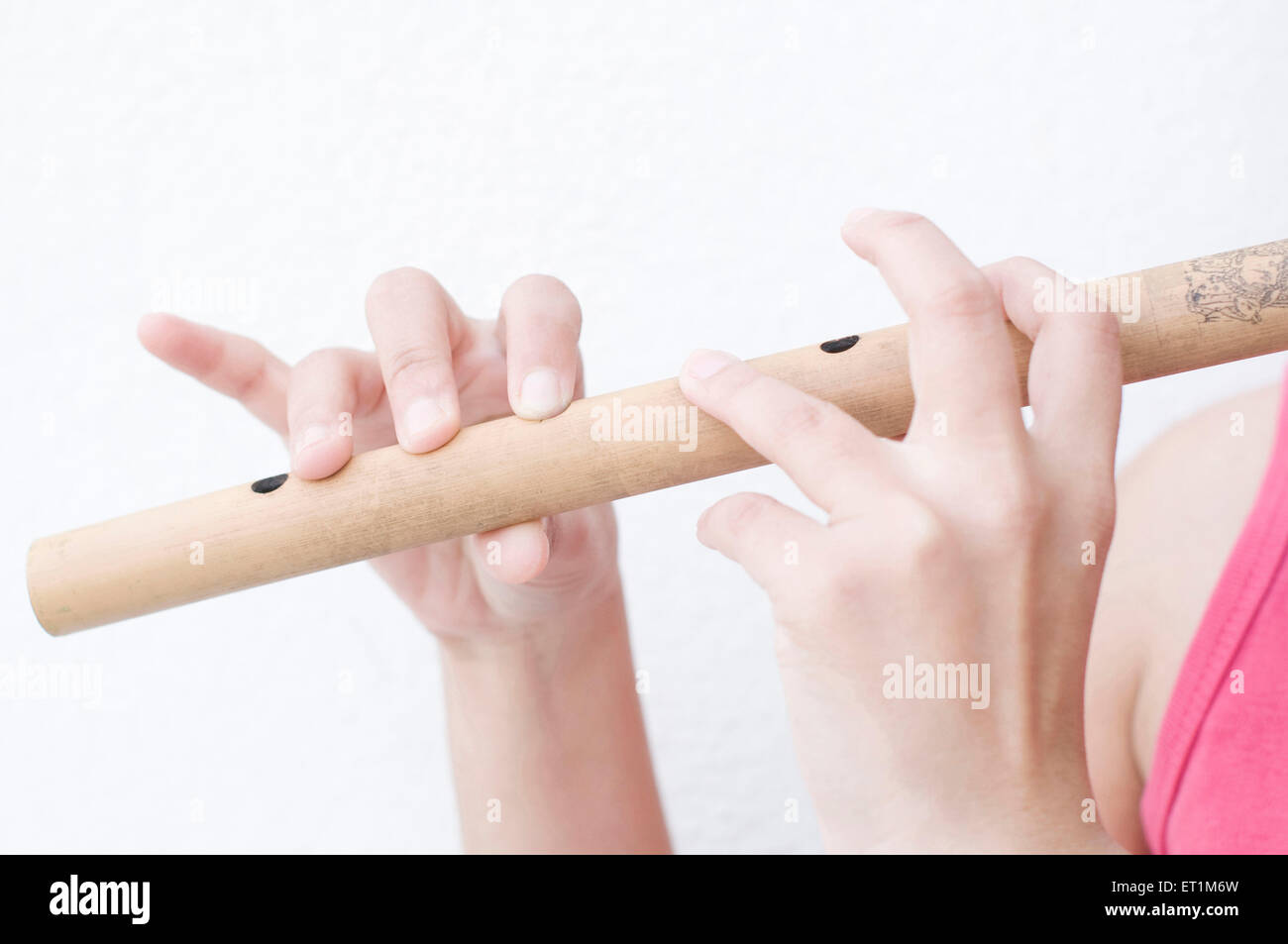 flute playing fingers hands , MR#686EE Stock Photo