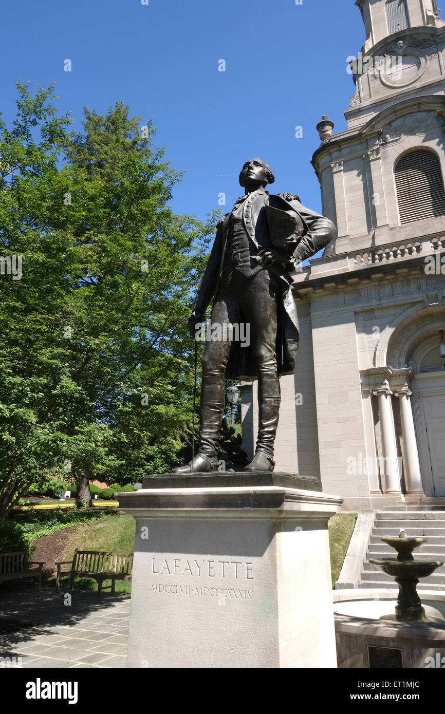 Colton Chapel on campus with statue of General Lafayette, College