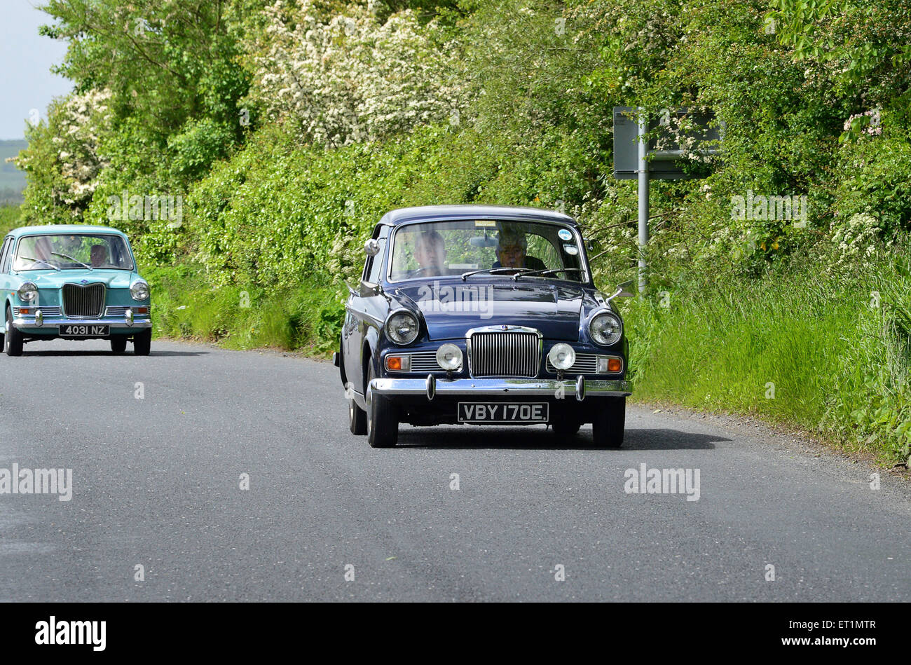 1965/67 Sunbeam Rapier Series V blue saloon on country road, Burnfoot, County Donegal, Ireland Stock Photo