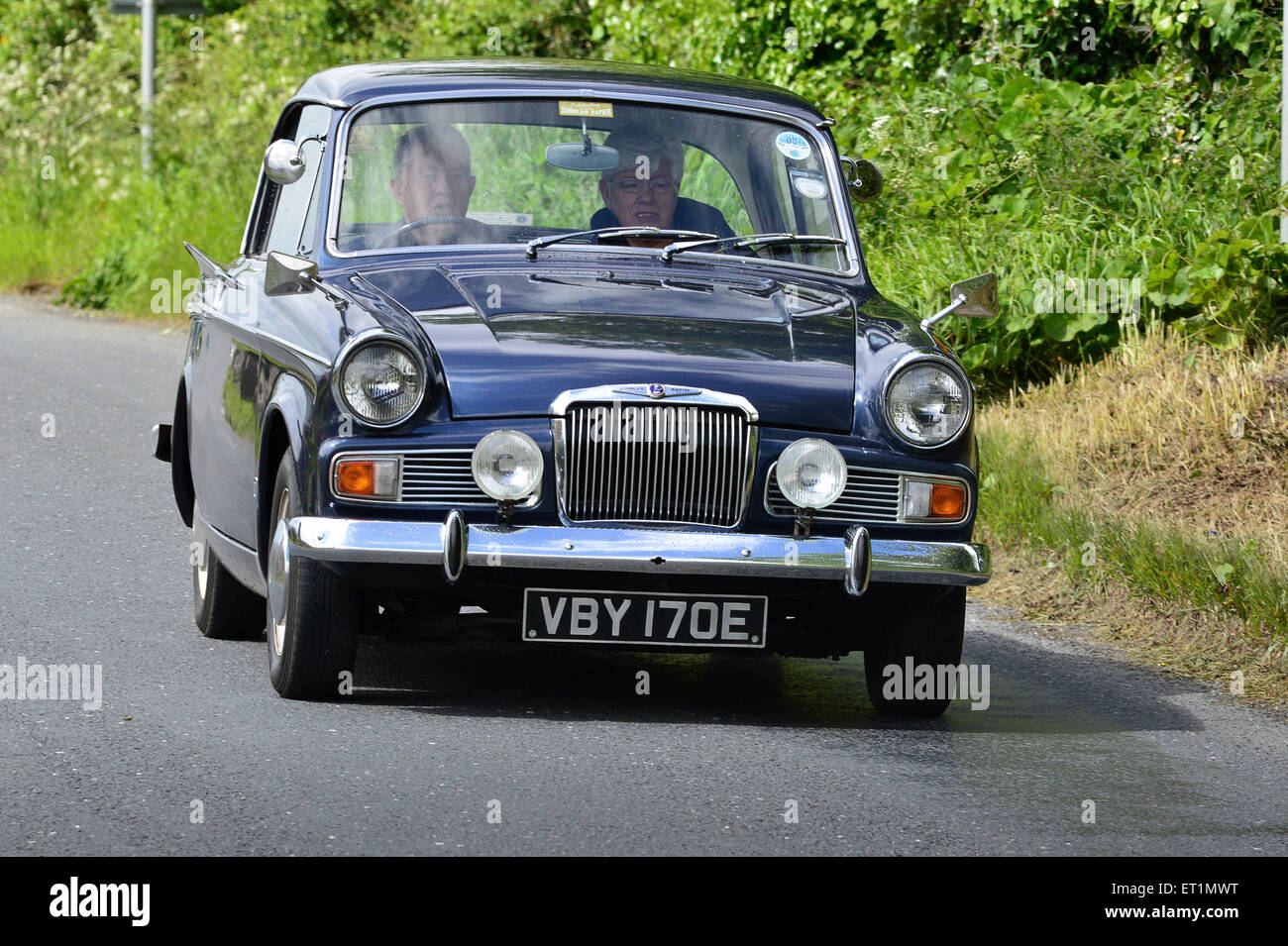 1965/67 Sunbeam Rapier Series V  saloon on country road, Burnfoot, County Donegal, Ireland Stock Photo