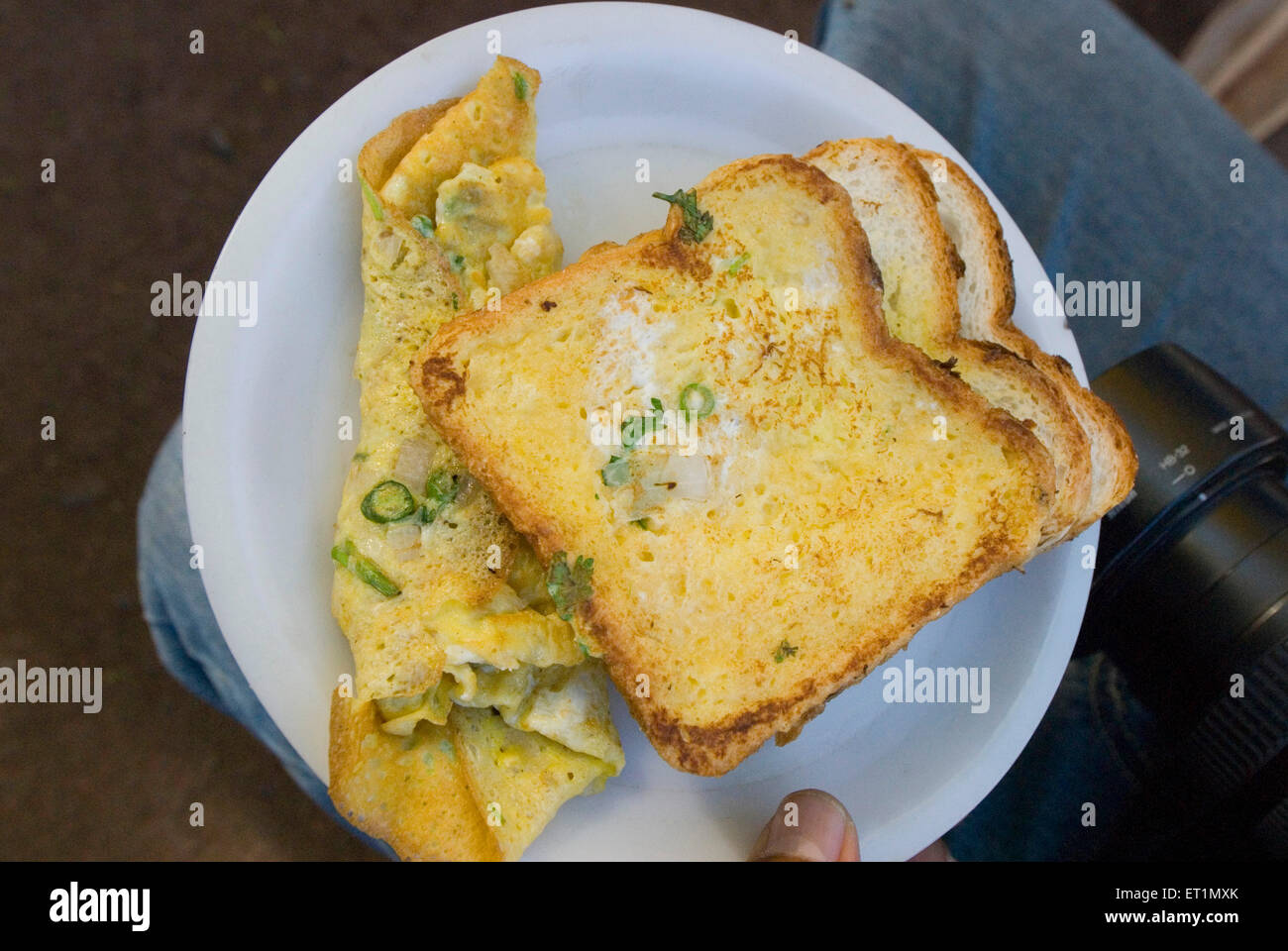 Nashta breakfast omelette bread ; India Stock Photo