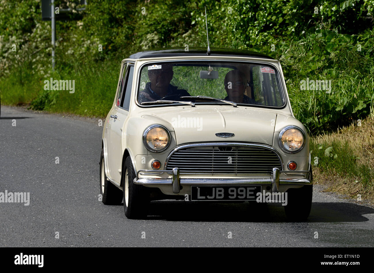 1960s Austin Mini Cooper classic car on country road, Burnfoot, County Donegal, Ireland. Stock Photo