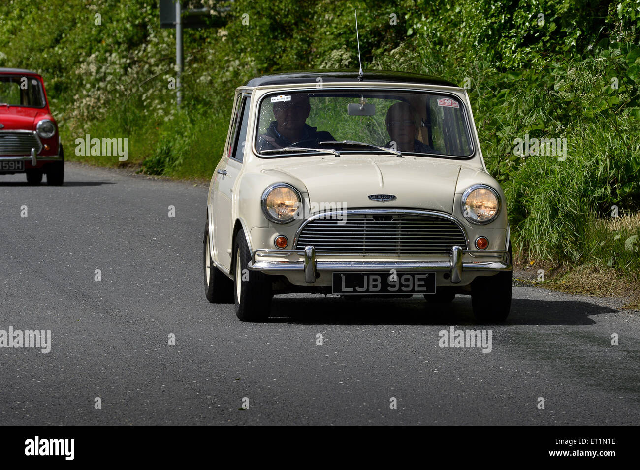 1960s Austin Mini Cooper classic car on country road, Burnfoot, County Donegal, Ireland. Stock Photo