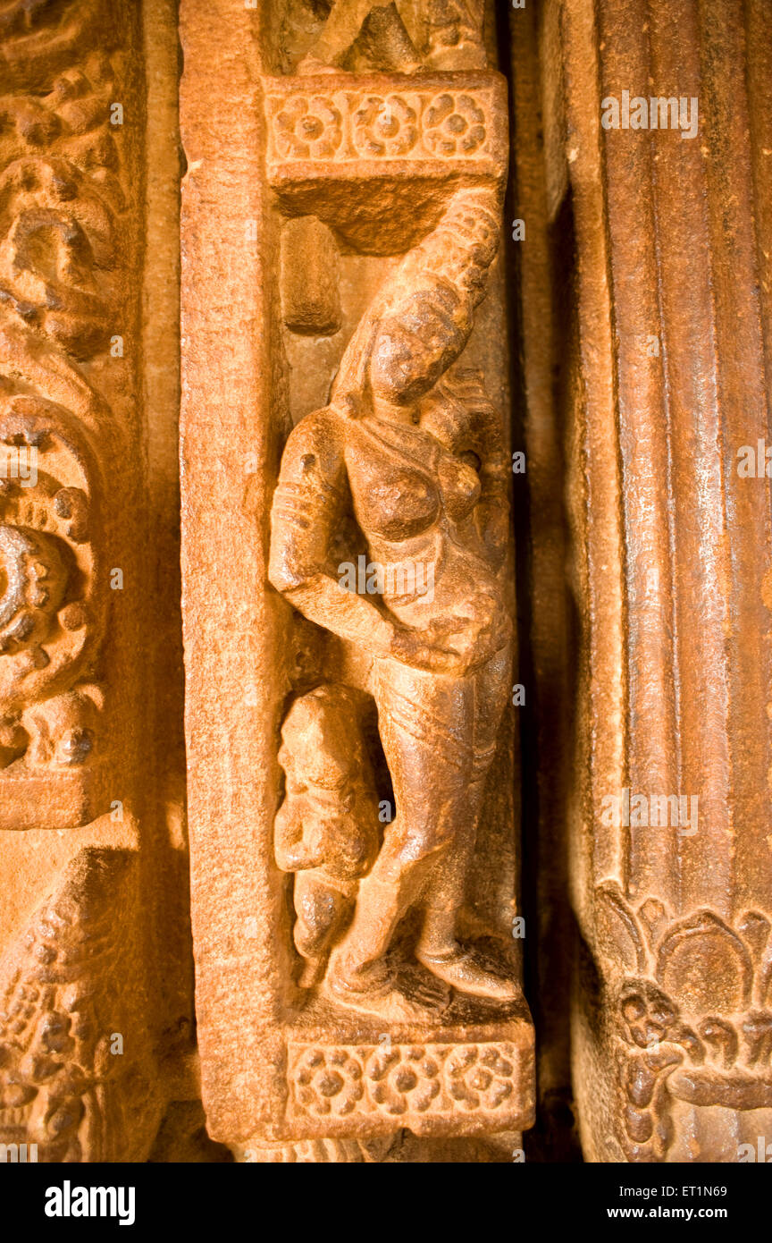 woman statue, woman sculpture, carved pillar, Durga temple, Aihole, Aivalli, Ahivolal, Aryapura, Bagalkot, Karnataka, India, Asia Stock Photo