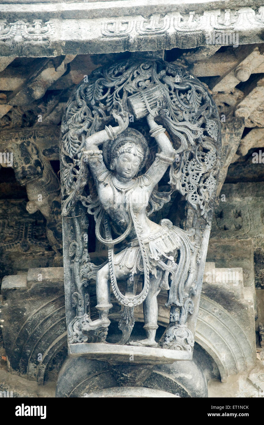 Mohini dancer statue on chennakesava temple ; Belur ; Hassan ; Karnataka ; India Stock Photo