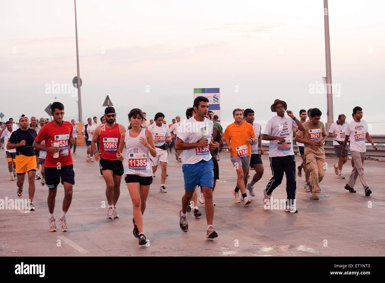 Marathon runners on sea link ; Bombay Mumbai ;  Maharashtra ; India NOMR Stock Photo
