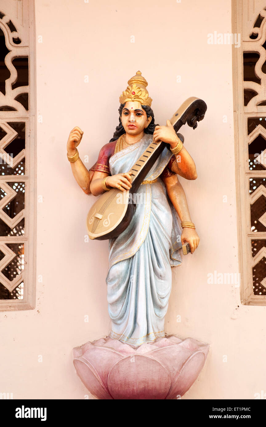 Statue of Goddess Saraswati with musical instrument veena on ...