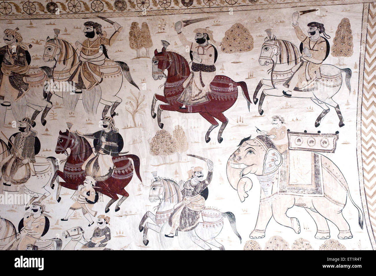 Wall painting mural soldiers on horses at Lakshminarayan temple ; Orchha ; Tikamgarh ; Madhya Pradesh ; India Stock Photo