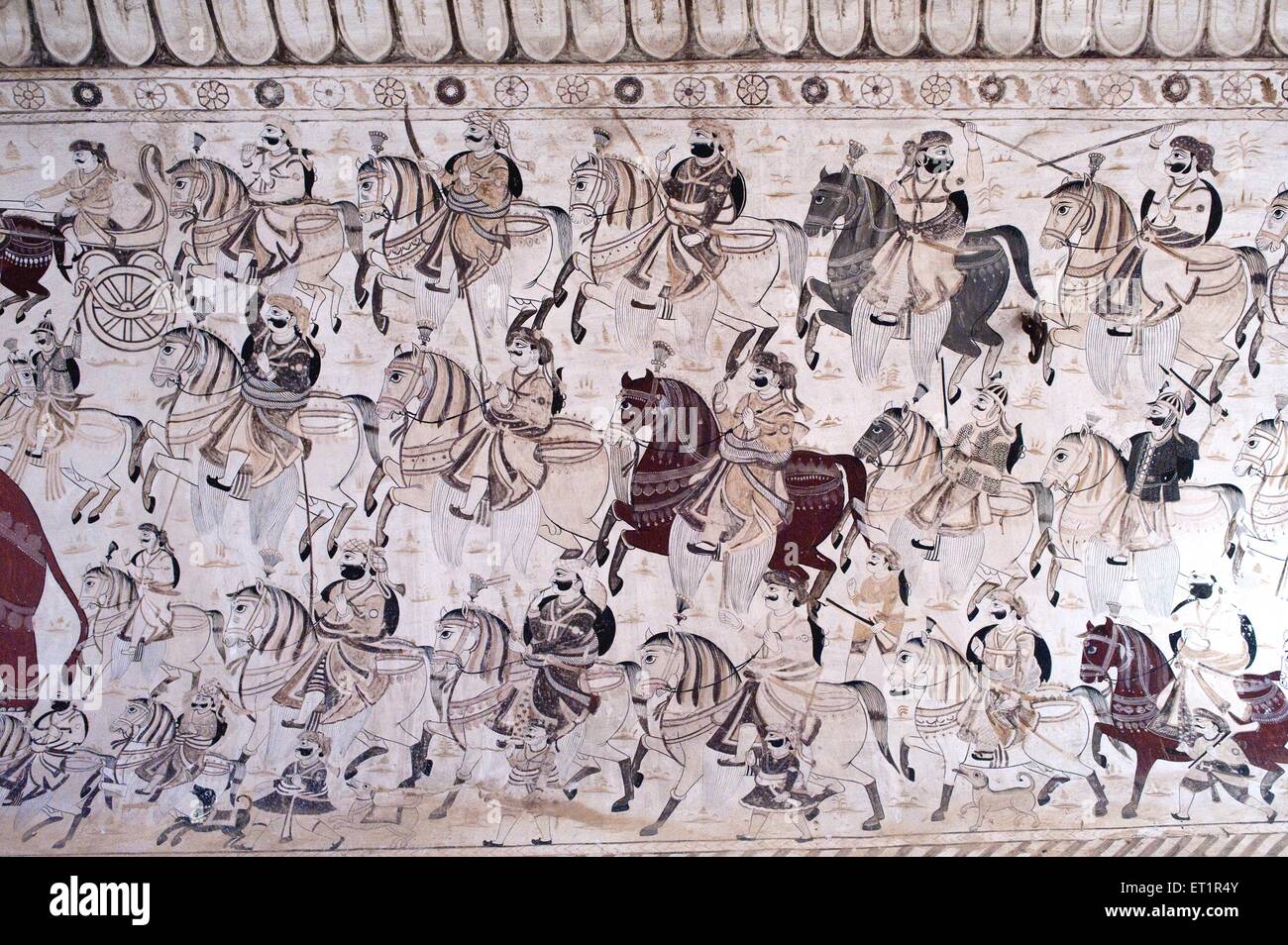 Wall painting mural soldiers on horses at Lakshminarayan temple ; Orchha ; Tikamgarh ; Madhya Pradesh ; India Stock Photo