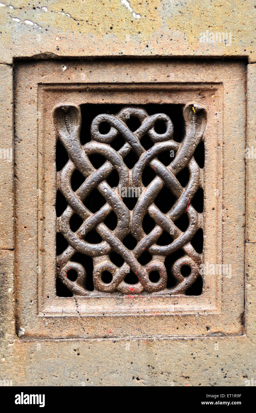 Serpent design lattice work jali kashi vishweshwar temple at wai satara Maharashtra India Asia Stock Photo