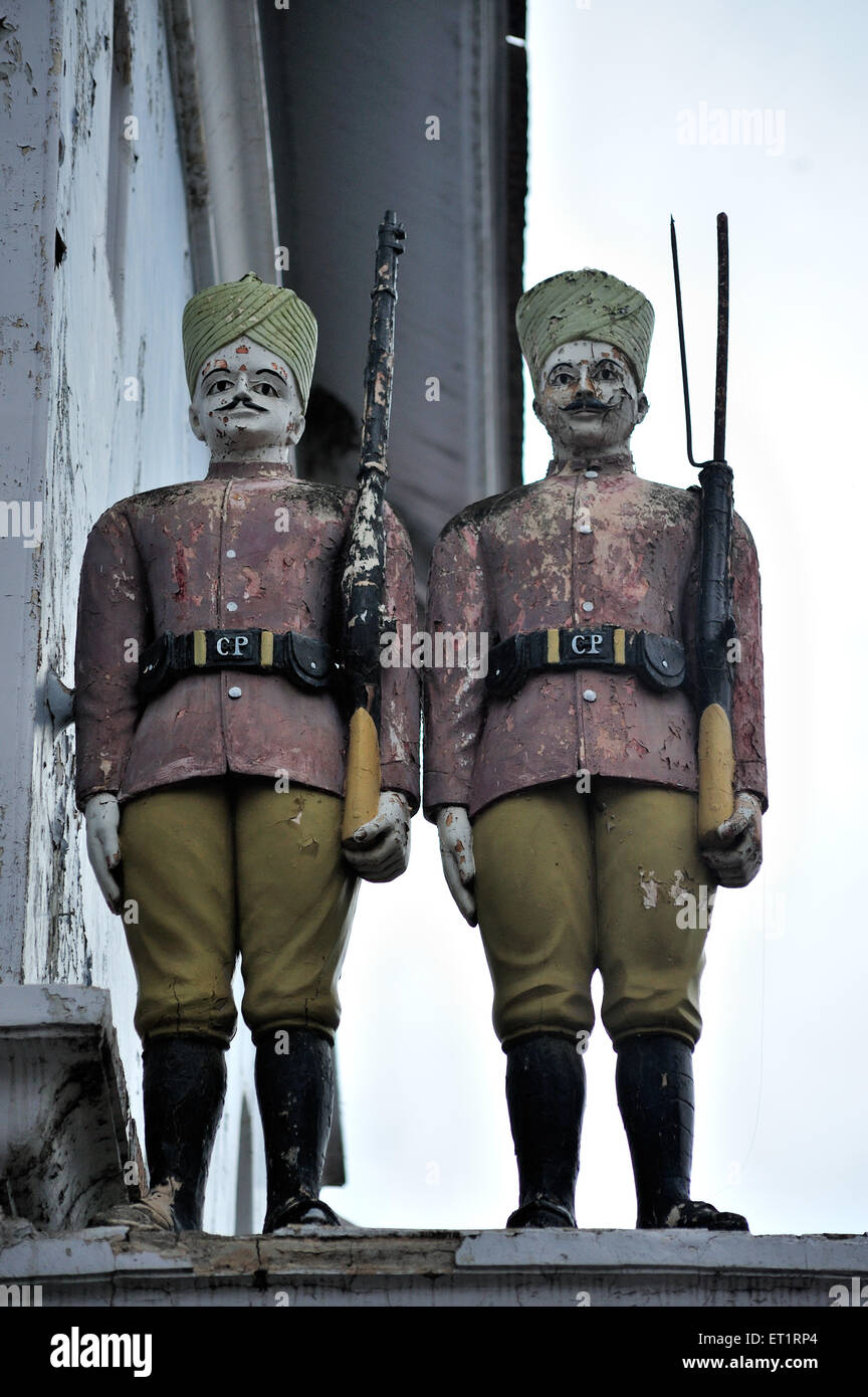 Statues of two guards with rifles phaltan samara Maharashtra India Asia Stock Photo