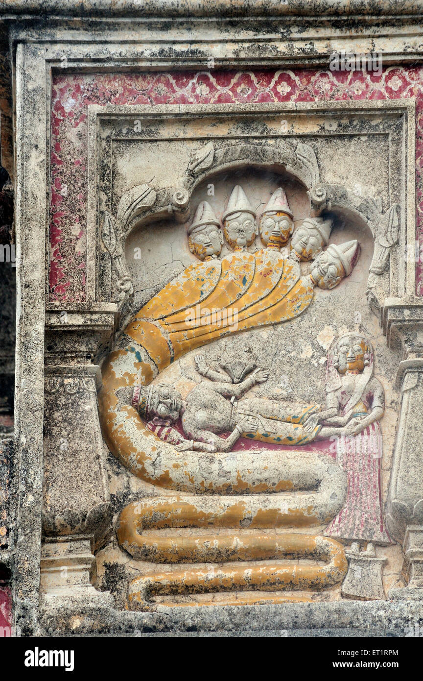 Vishnu resting on Shesha naga relief sculpture on bhuleshwar temple at yawat pune Maharashtra India Asia Stock Photo