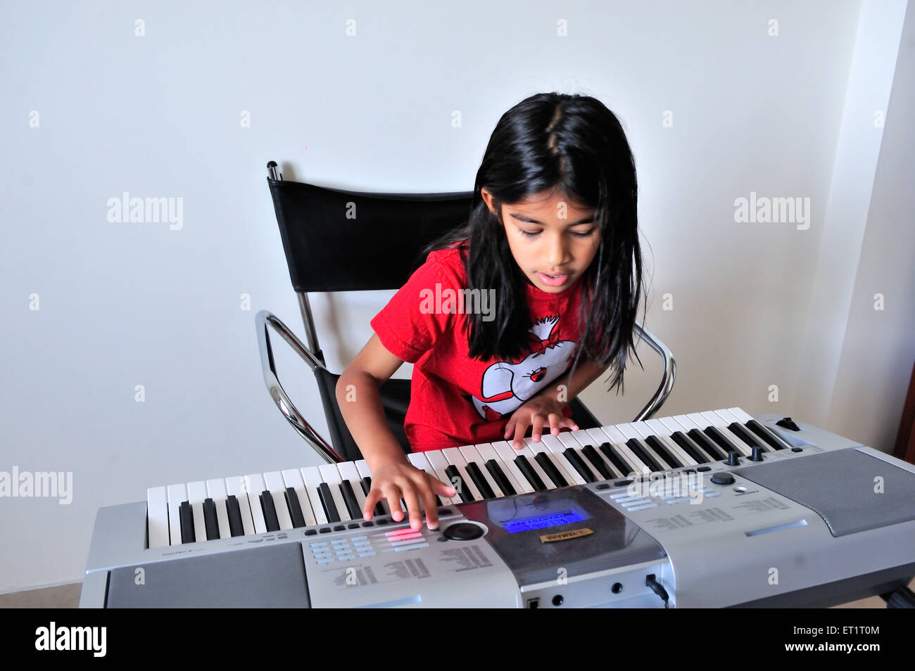 Maharashtrian girl playing synthesizer MR#556 Stock Photo