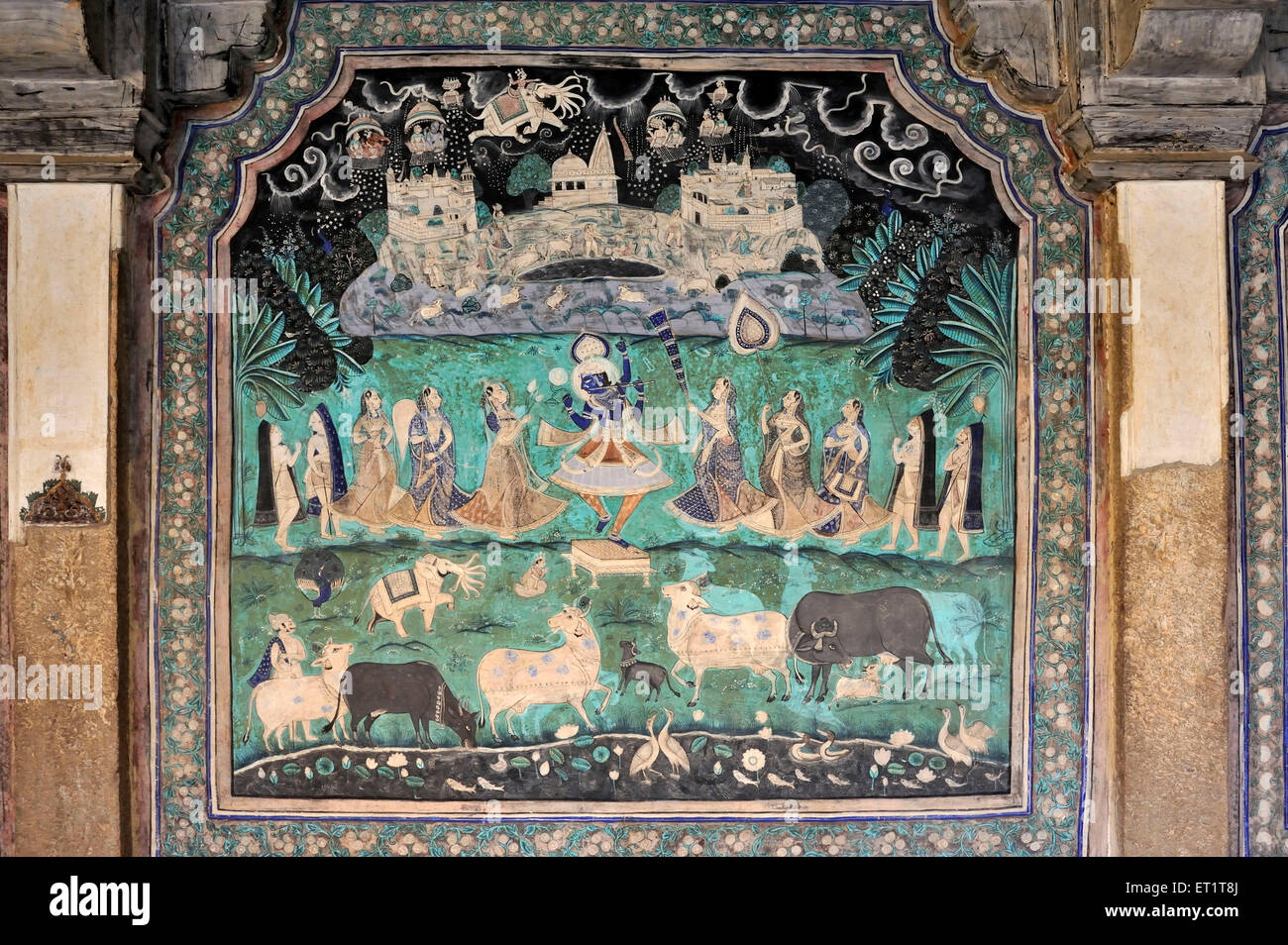 Miniature painting , Krishna Leela , Krishna lifting Govardhan hill with little finger , Chitrashala , Umaid Mahal , Bundi , Rajasthan , India , Asia Stock Photo