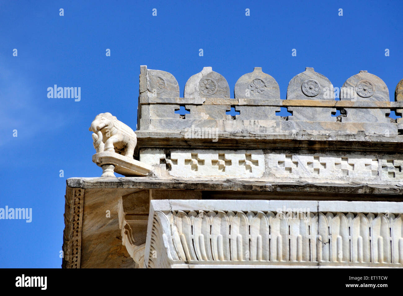 Statues carved in the corners of roof of adinatha jain temple ranakpur at rajasthan india Asia Stock Photo