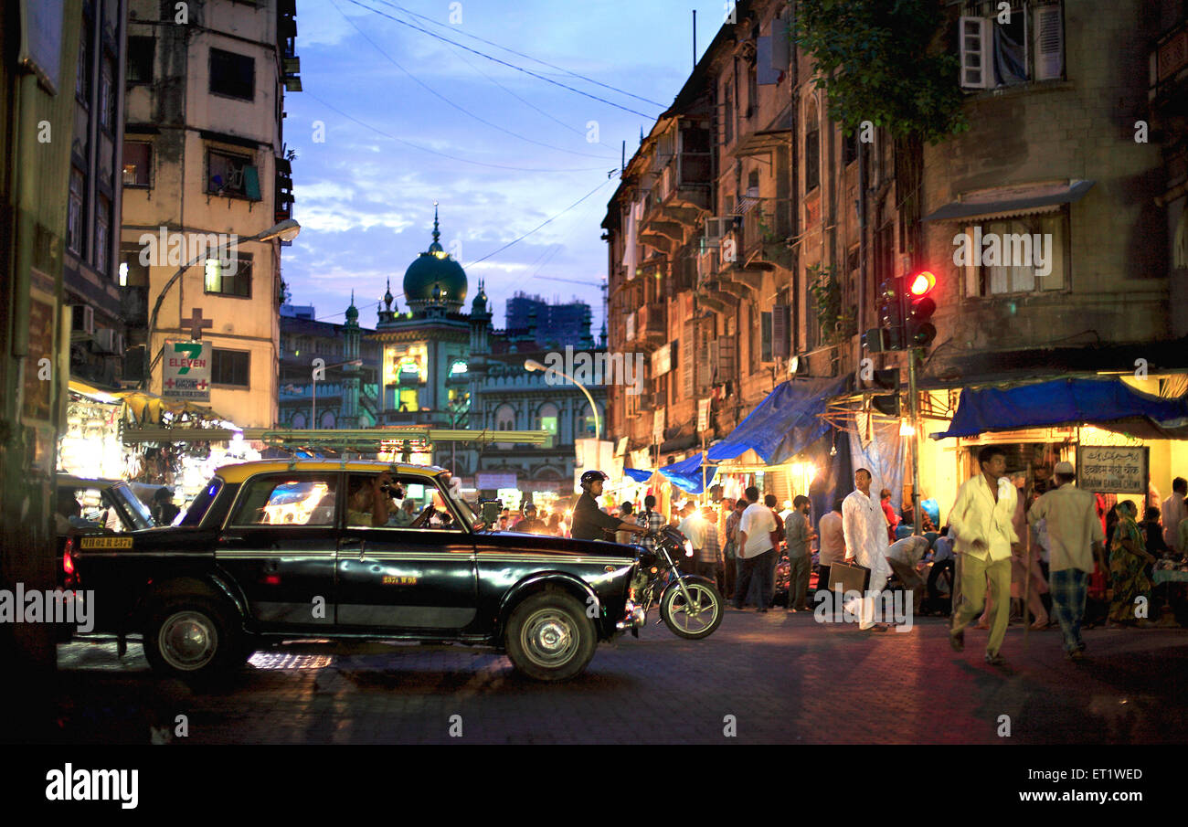 Traffic and street scene during Ramzan ; Mohammed Aii road ; Bombay Mumbai ; Maharashtra ; India Stock Photo