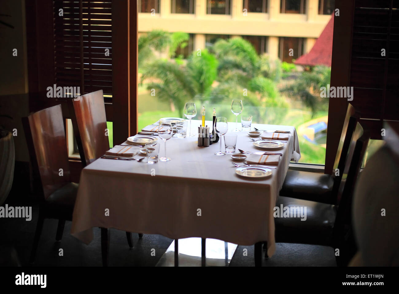 Dining table in hotel with cutlery ; Bombay Mumbai ; Maharashtra