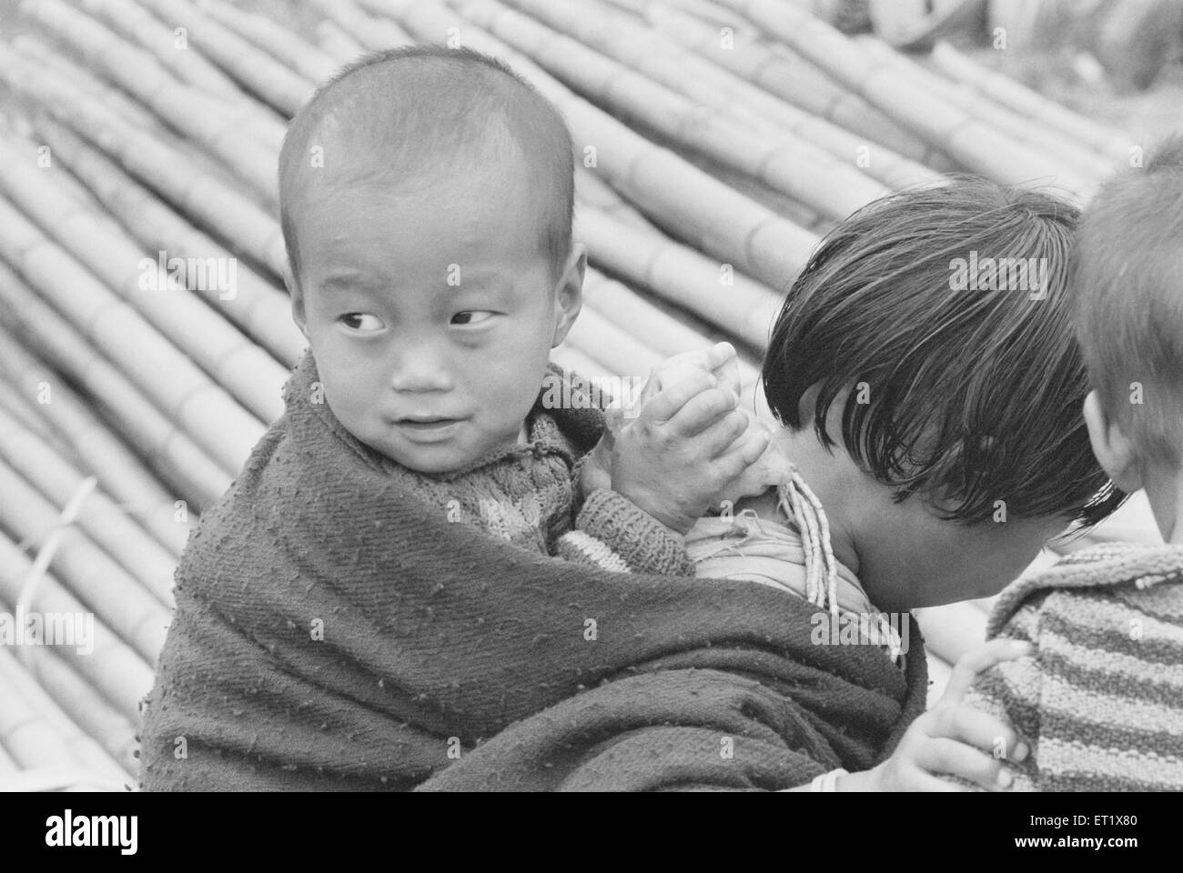 Apa Tani child ; Arunachal Pradesh ; India ; Asia ; old vintage 1900s picture Stock Photo