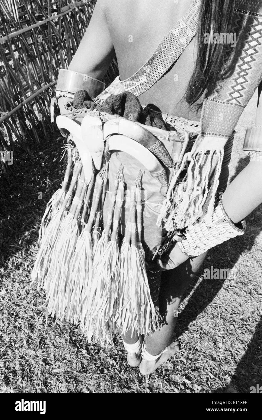 Adornment tied to waist of tribal  Apa Tani ; Arunachal Pradesh ; India ; Asia ; old vintage 1900s picture Stock Photo