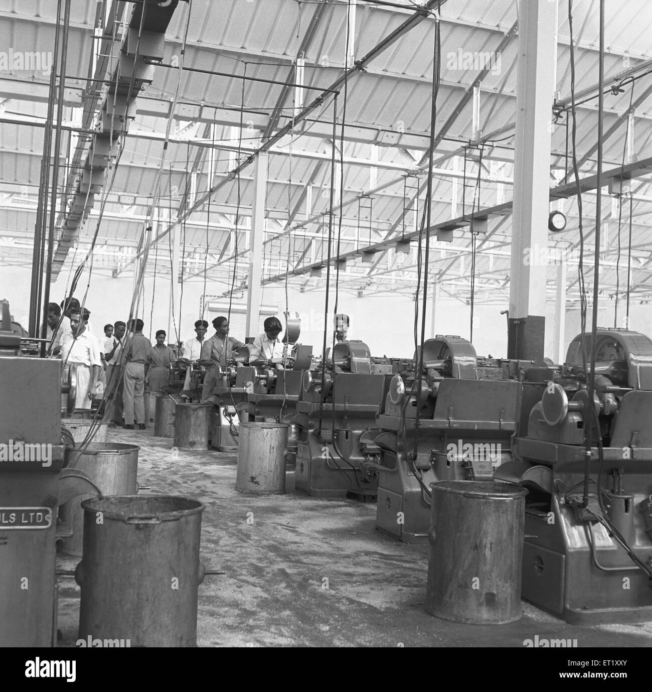 Interior of the telephone factory ; manufacturing of telephone instruments at Bangalore ; Karnataka ; India ; Asia ; old vintage 1900s picture Stock Photo