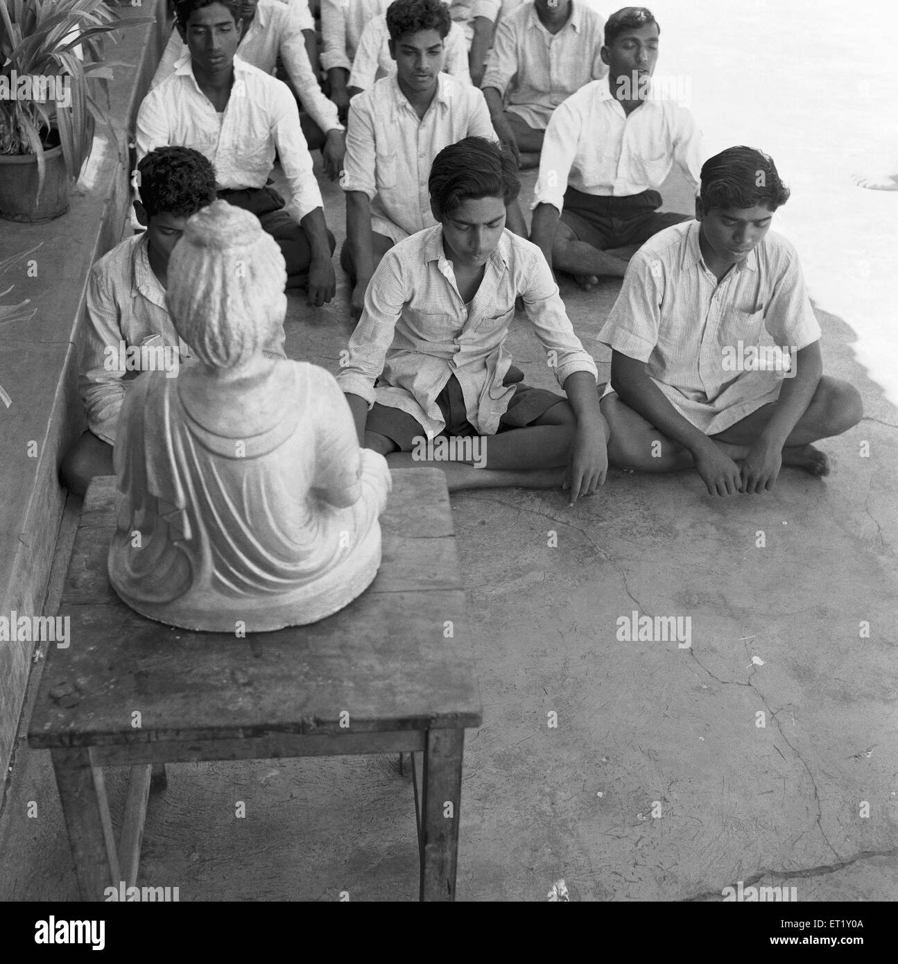 Pupils in classroom ; VIDYAPITH is training rural youth ; Nanjangud town Mysore ; Karnataka ; India ; Asia ; old vintage 1900s Stock Photo