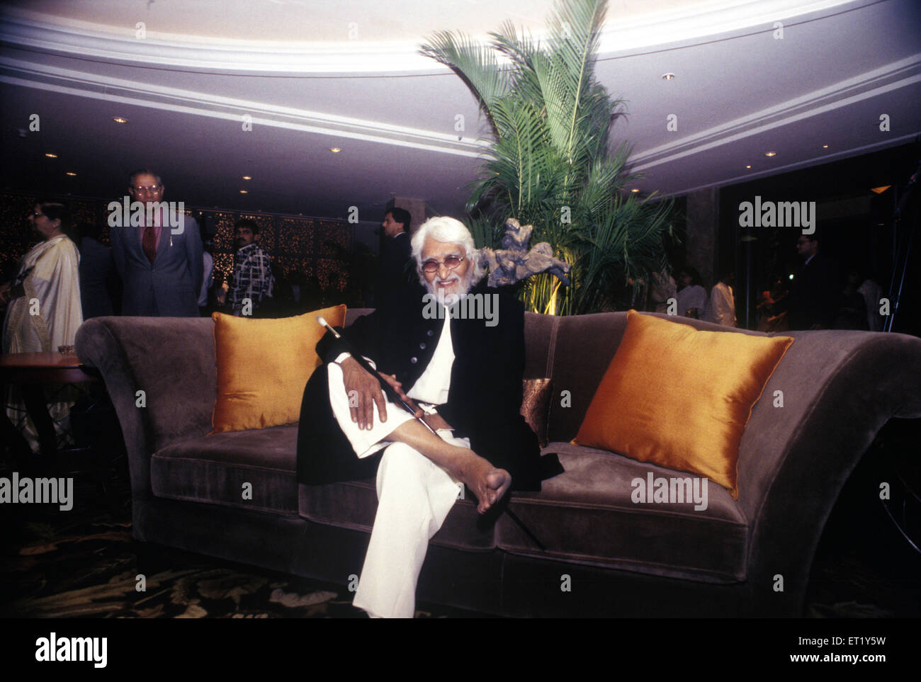 M F Husain sitting on sofa India Asia Stock Photo