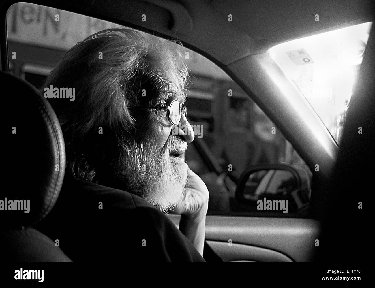 M F Husain thoughtful mood in car flora fountain mumbai Maharashtra India Asia Stock Photo