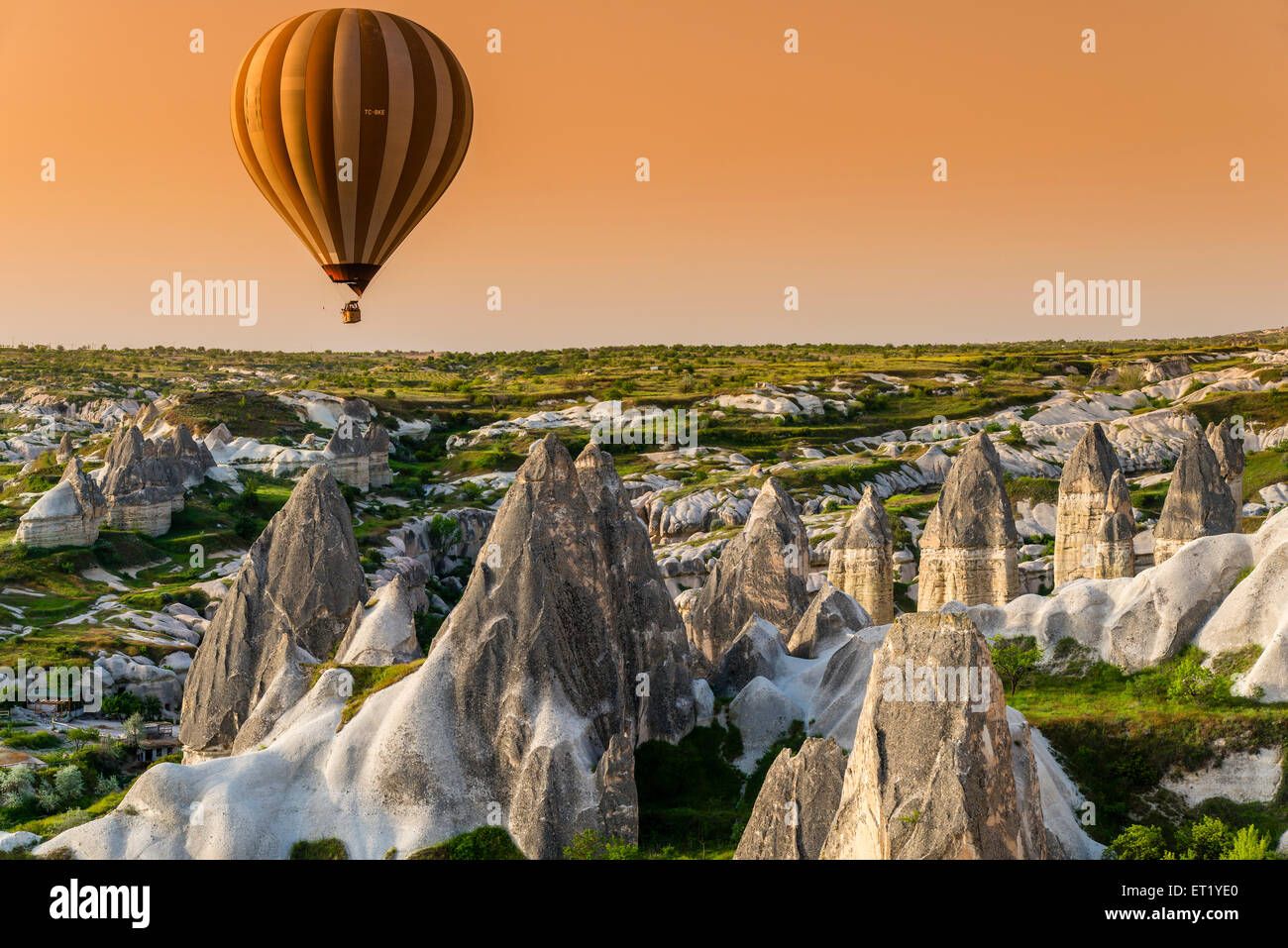 Sunrise landscape with hot air balloon, Goreme, Cappadocia, Turkey Stock Photo