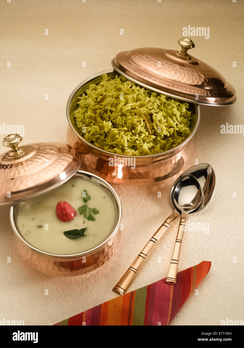 Food ; mung dal khichdi with kadhi served in pots Stock Photo