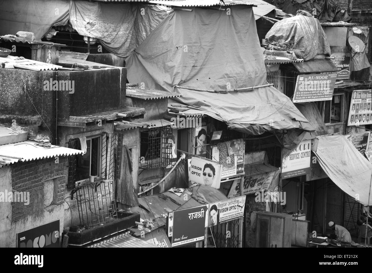 Slum Behram Naupada at Anant Kanekar Marg ; Bandra ; Bombay Mumbai ; Maharashtra ; India 9 September 2009 Stock Photo