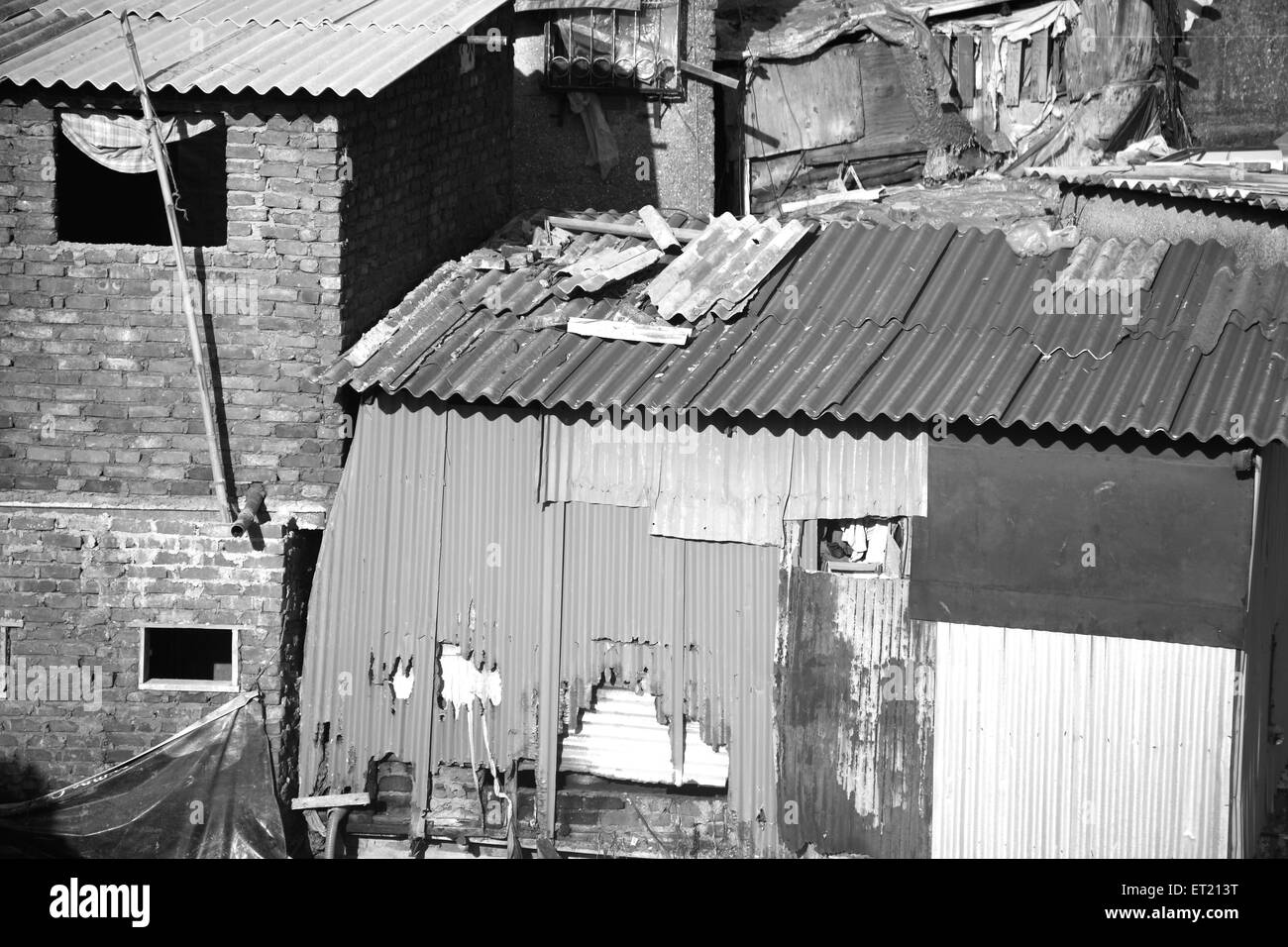 Slum Behram Naupada at Anant Kanekar Marg ; Bandra ; Bombay Mumbai ; Maharashtra ; India 17 September 2009 Stock Photo