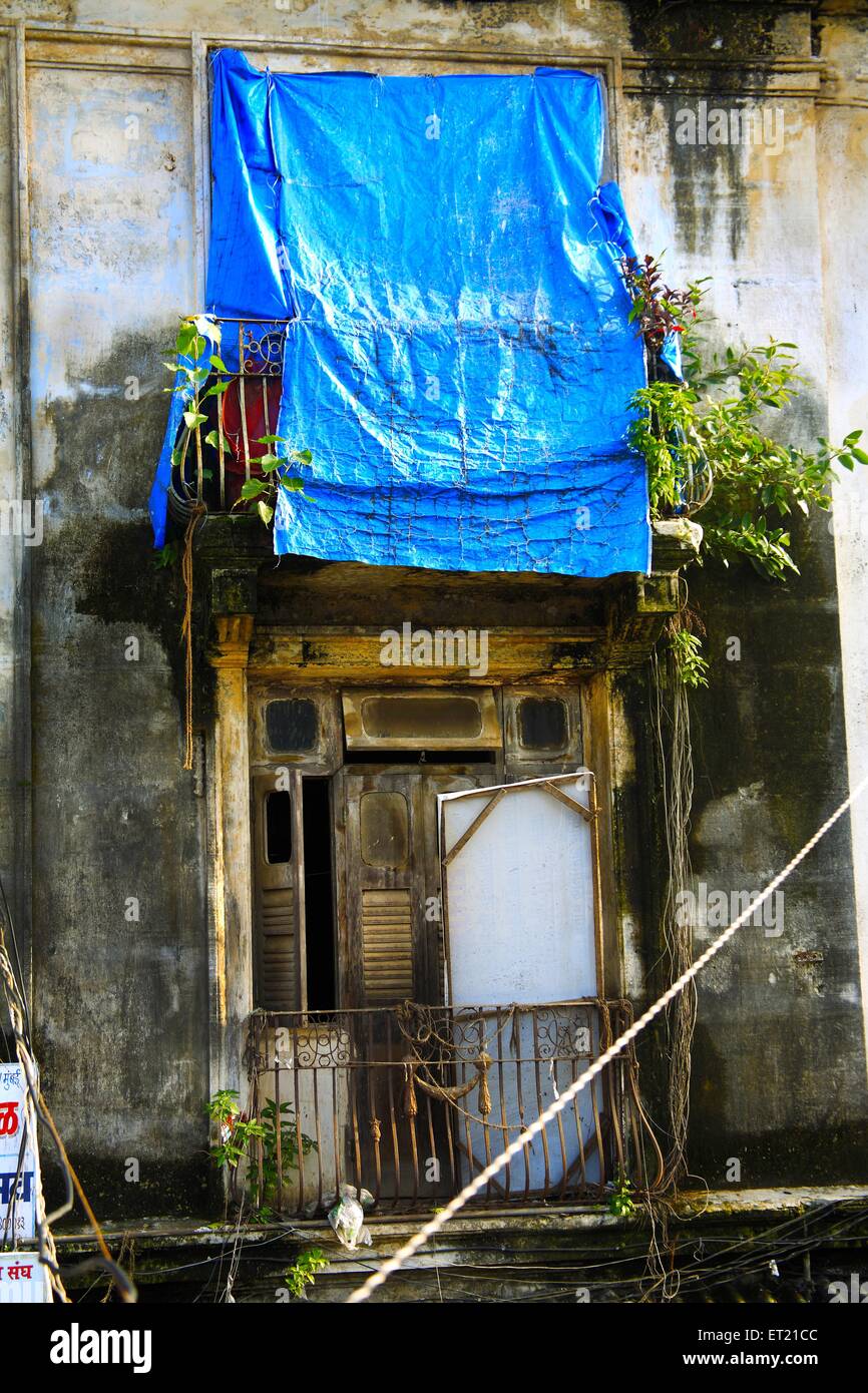 Broken door of chawl ; Lower Parel ; Bombay ; Mumbai ; Maharashtra ; India ; Asia ; Asian ; Indian Stock Photo
