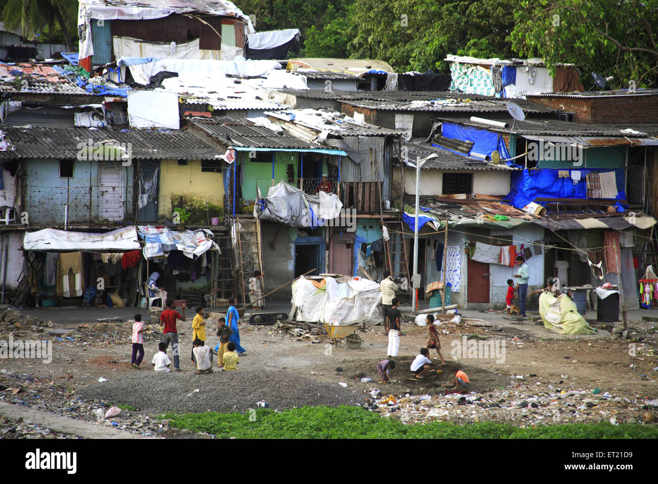 Slum children playing ; Bandra ; Bombay ; Mumbai ; Maharashtra ; India Stock Photo