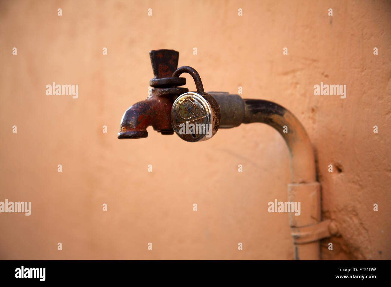 Locked tap, Mahim Sion slum, Bombay, Mumbai, Maharashtra, India, Asia, Asian, Indian Stock Photo