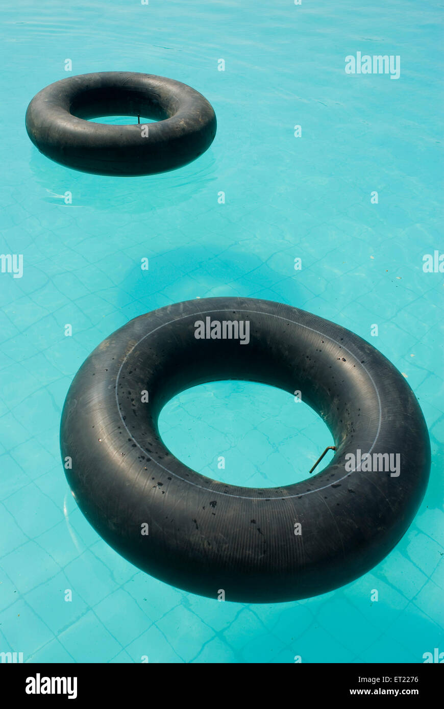 Inflated tire tube in swimming pool, Anjar, Kutch, Kachchh, Gujarat, India, Asia Stock Photo