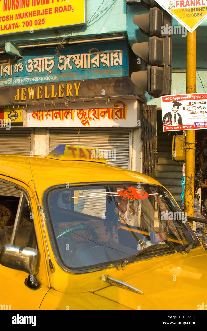 Ambassador yellow taxi, Bhowanipore, Bhowanipur, Calcutta, Kolkata, West Bengal, India, Asia Stock Photo