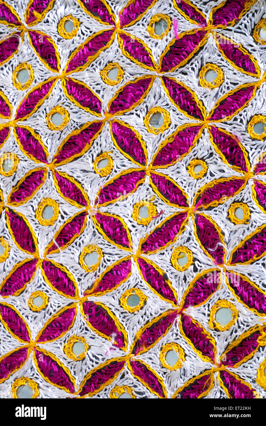 Mirror embroidery table cloth white violet and yellow threads ; Mulund ; Bombay ; Mumbai ; Maharashtra ; India ; Asia Stock Photo