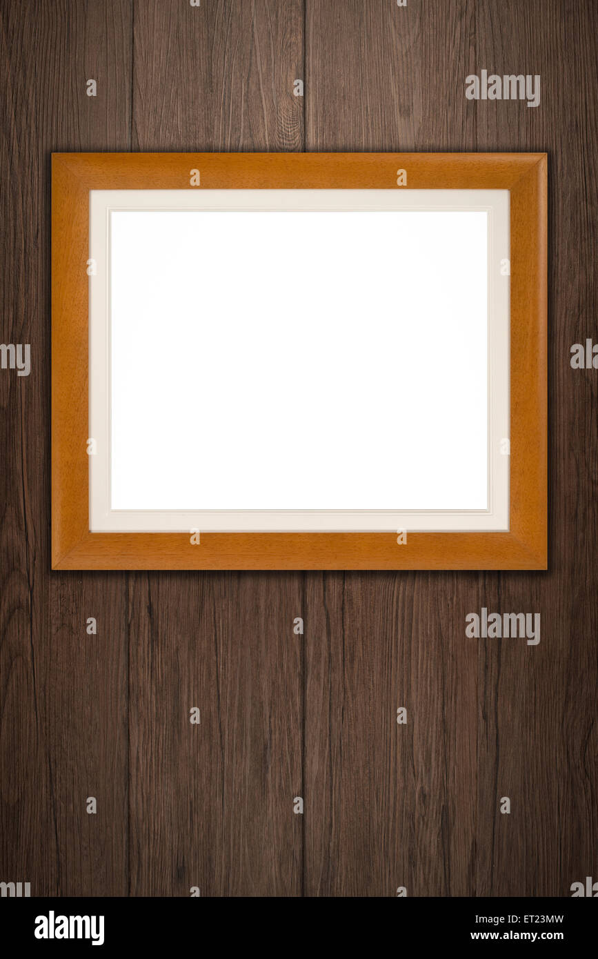 Old picture frame on vintage wood wall Stock Photo - Alamy