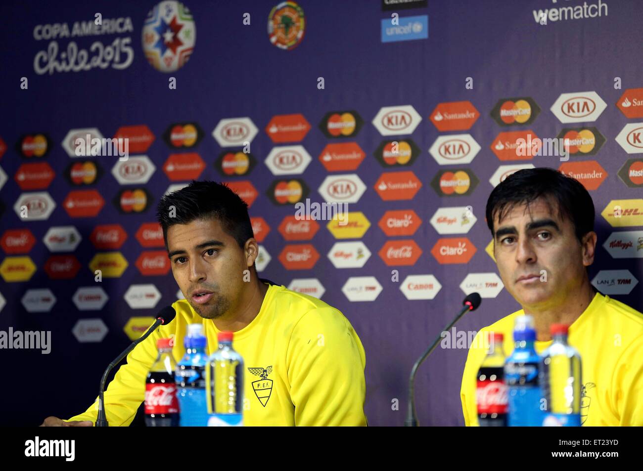 Santiago, Chile. 10th June, 2015. The coach Gustavo Domingo Quinteros (R) and the player Christian Noboa Tello of Ecuador's National Team take part in a press conference prior to the opening game of 2015 Copa America against Chile, in Santiago, Chile, on June 10, 2015. The 2015 Copa America, will be held in Chile from June 11 to July 4. Credit:  Claudio Fanchi/TELAM/Xinhua/Alamy Live News Stock Photo