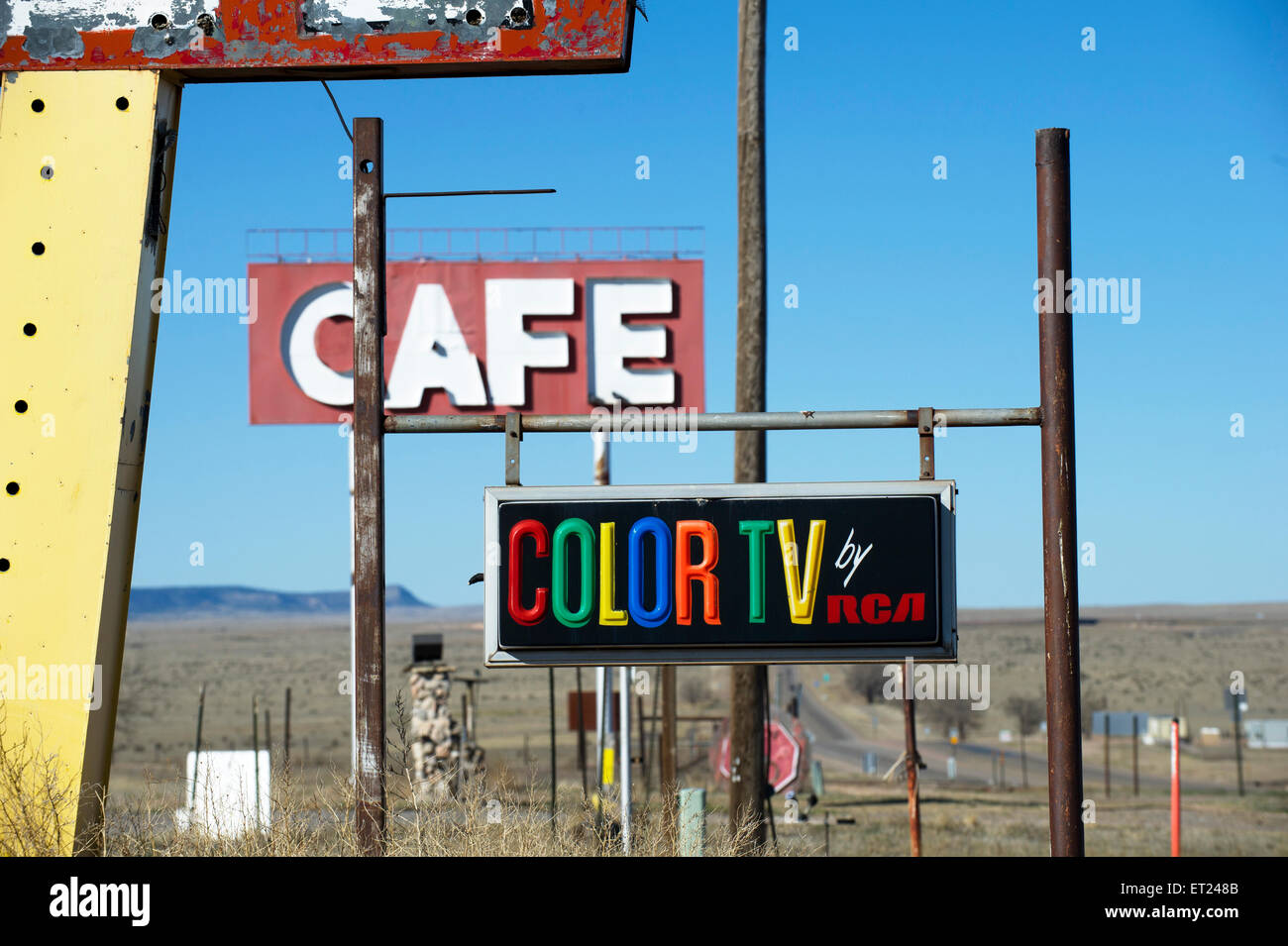 A vintage Color TV by RCA sign by a motel and café in State of New Mexico in the Southwest USA. Stock Photo