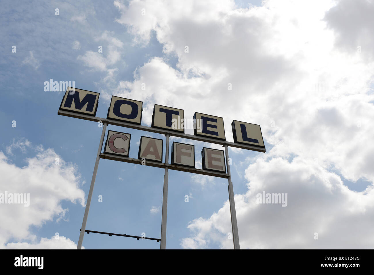 Clouds over a Motel and Cafe sign in Conway, Texas in the Southwest USA along historic Route 66. Stock Photo