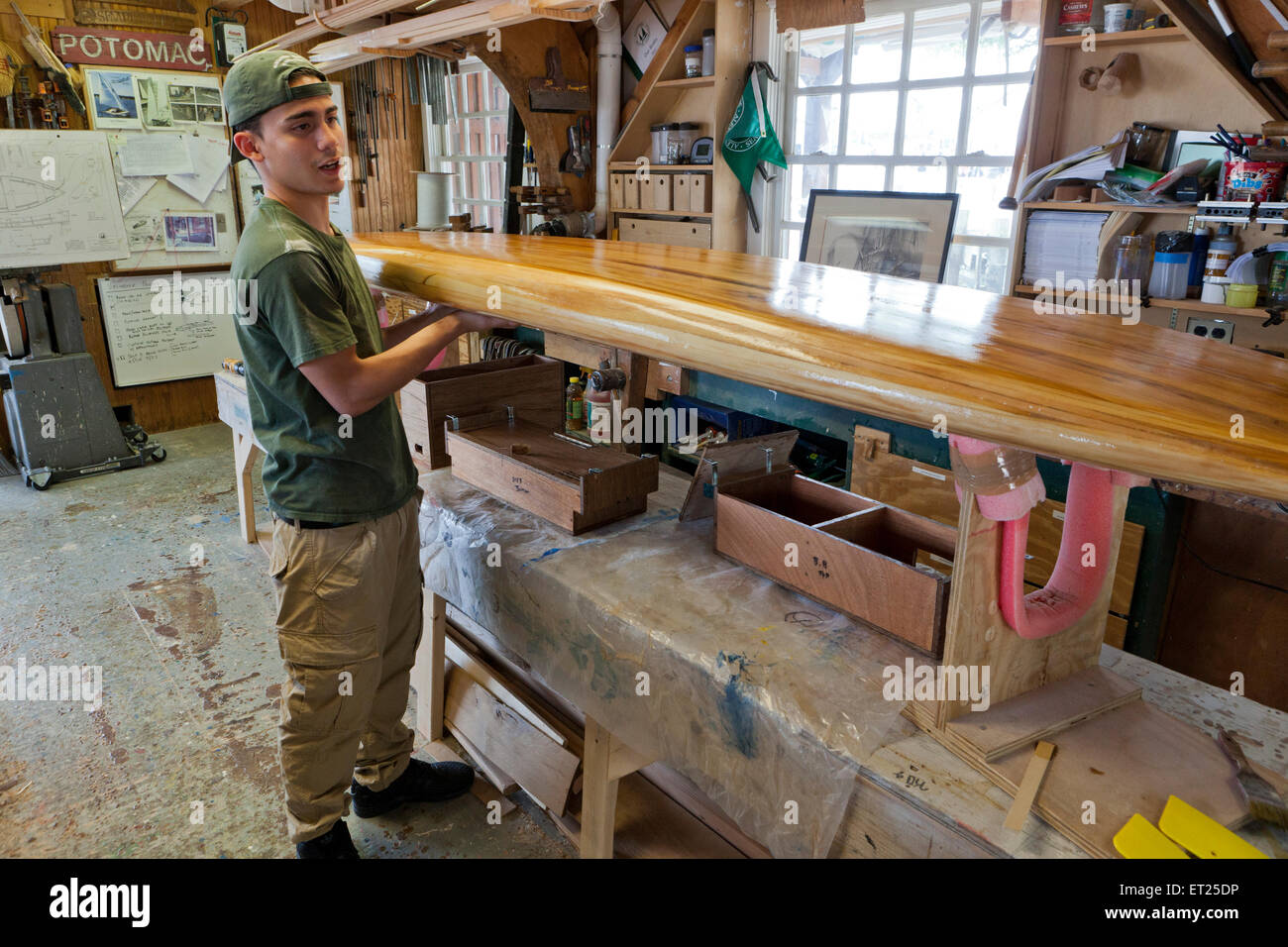 Man building a wooden surfboard - USA Stock Photo