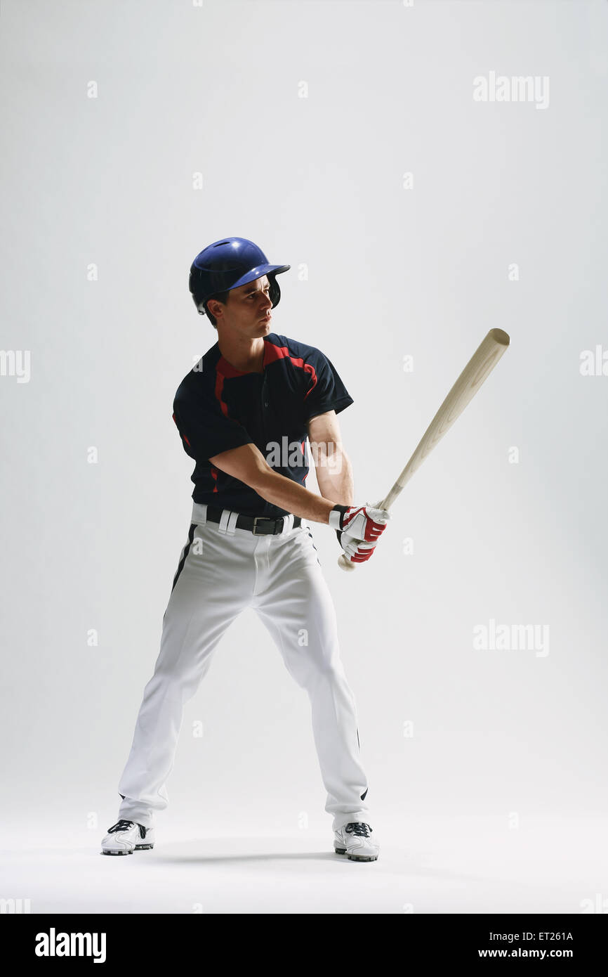 Baseball batter against white background Stock Photo Alamy