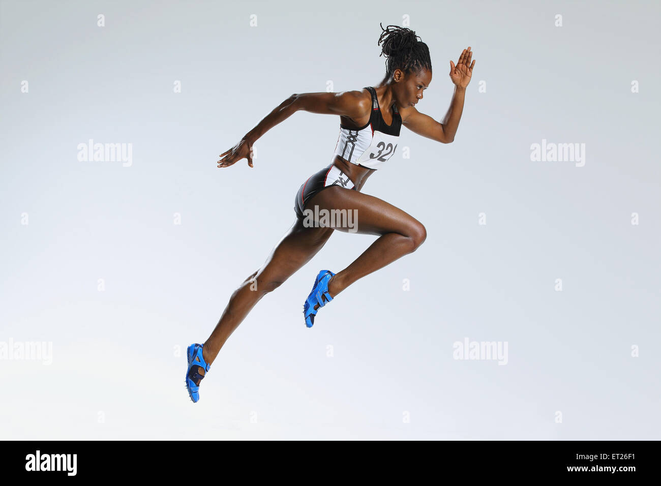 Female Athlete Running Stock Photo
