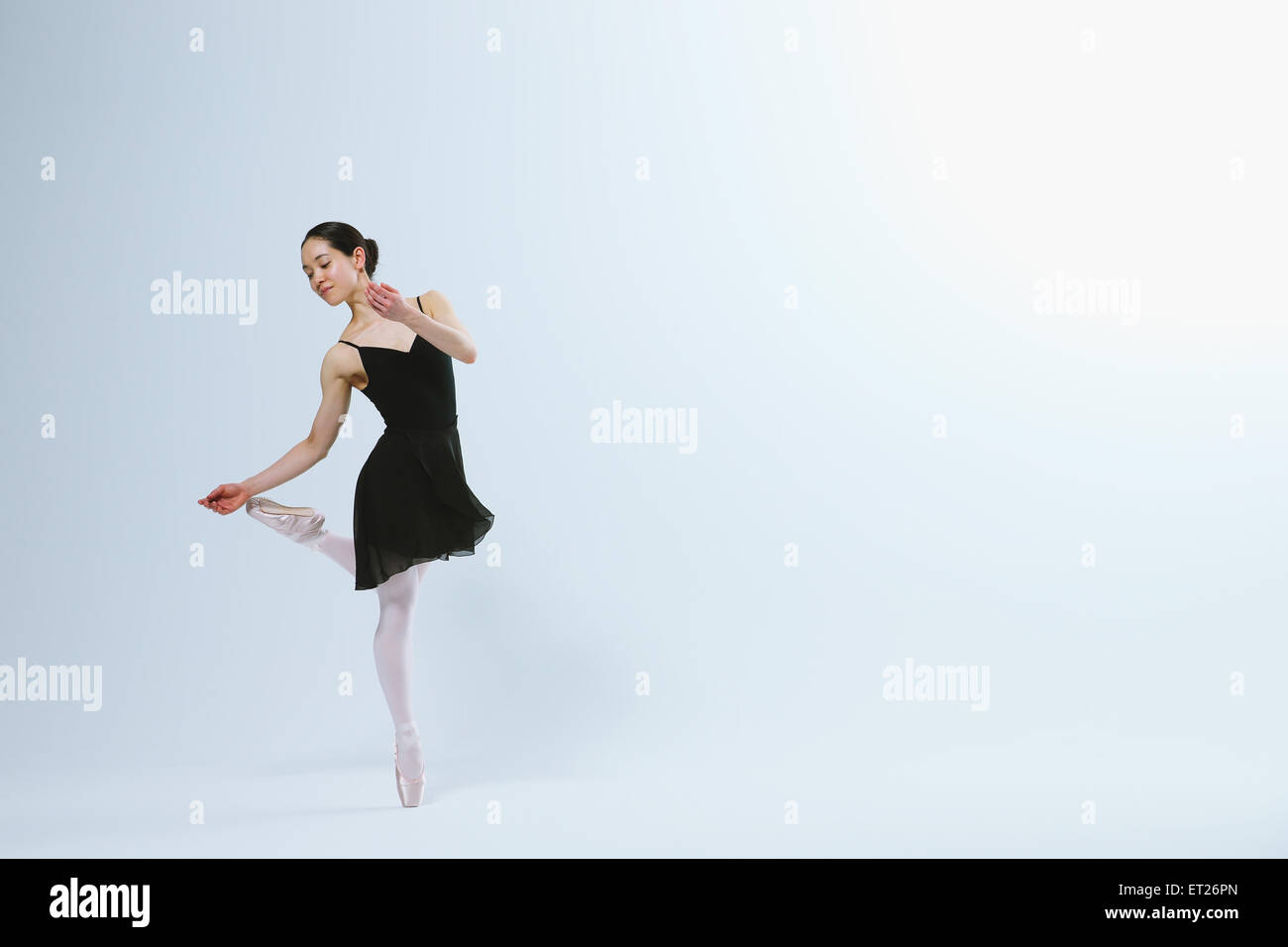 Beautiful Healthy Asian Woman in Ballet Dress Enjoying in