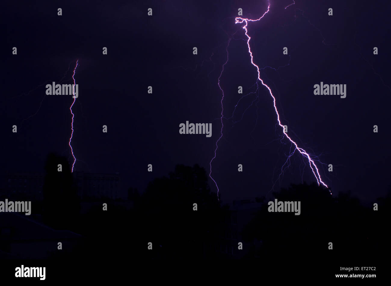 lightning in city at night Stock Photo - Alamy